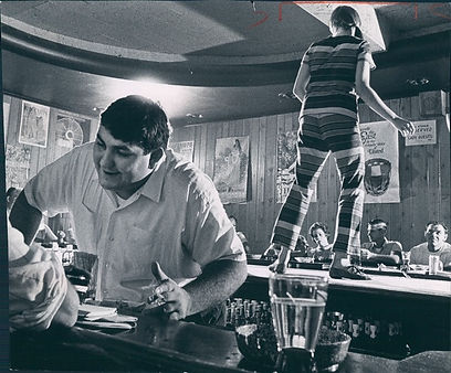 Nick Anagnos working behind the bar at Popeye's in the early years